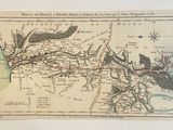 une vieille carte d'une ville traversée par une rivière