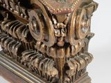 a very old wooden box with gears inside of it