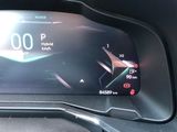 a digital display on the dashboard of a car