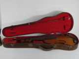 a violin case with a violin inside of it