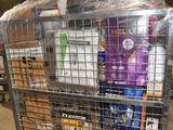 a metal cart with many items in it in a warehouse