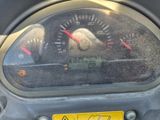 a close up of a speedometer on a motorcycle