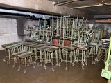 many chairs and tables in a room with a lot of them