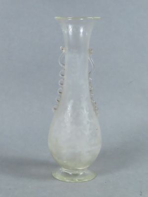 an image of a glass vase on a gray background