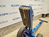 an image of a hand truck with a wooden box on it