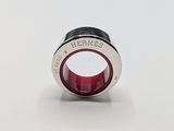 a close up of a ring with the word hermes on it