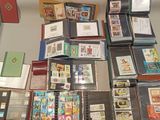 a lot of different types of stamps on the table
