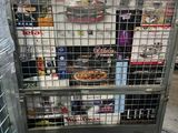 a metal cart with food in it in a warehouse