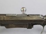 a gun that is sitting on top of a table
