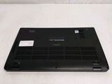 a black laptop that is sitting on a white surface
