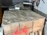 a lot of boxes that are stacked up in a room