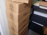 boxes stacked on top of each other in a room