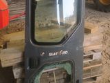 a picture of a forklift door with a mirror on it