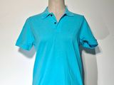 un polo bleu sur un mannequin, un mannequin, un mannequin, un mannequin, un mannequin, un mannequin, un mannequin, un mannequin, un mannequin