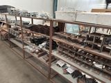 many different types of tools on the shelves in the warehouse