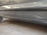 a close up of a car with a flat tire