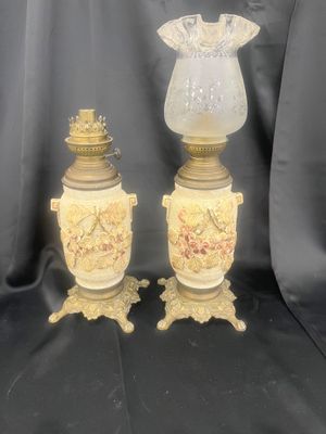 Paire de lampe à pétrol en céramique et bronze