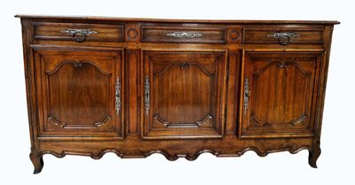 an image of a wooden sideboard with three doors and two drawers