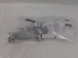 a picture of a faucet that is in a plastic bag