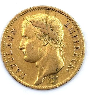 an image of a gold coin with a woman ' s head on it