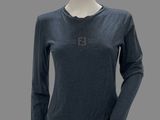 a mannequin mannequin wearing a blue shirt and black pants
