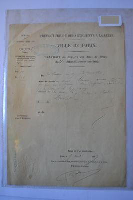 an old document with writing on it sitting on top of a table