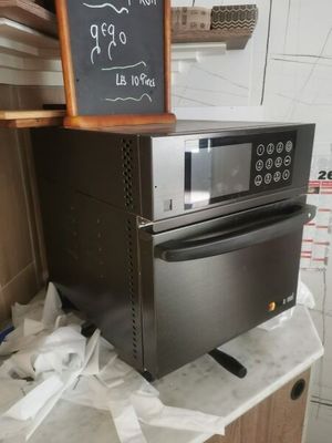 two ovens stacked on top of each other on a counter