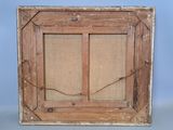 a close up of a picture of a wooden frame on a table