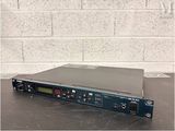 a close up of a radio receiver sitting on top of a table