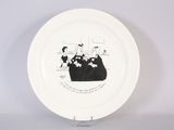 a white plate with a drawing of a group of people on it