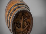 a close up of a wooden barrel with an anchor on it