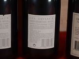three bottles of wine that are on a table