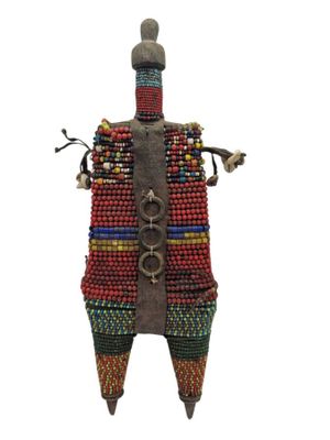 a close up of a doll made out of beads on a white background