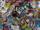 a pile of dvds and cds on the floor