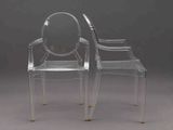 two clear chairs sitting next to each other on a gray surface