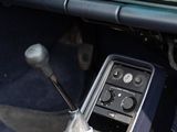 a car dashboard with a steering control in it