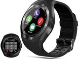 a black smart watch with a calculator and calculator on the screen