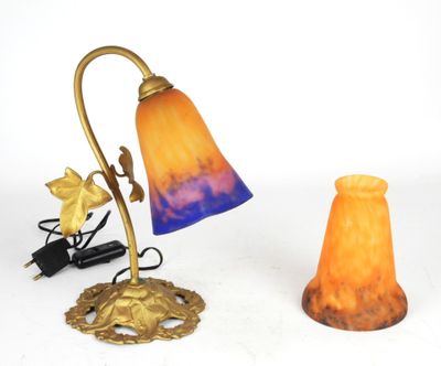 two lamps that are sitting on a white surface
