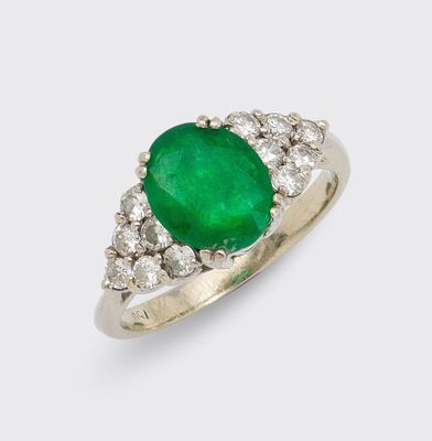 an emerald and diamond ring