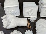 many pieces of art that are sitting on a table