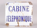 a blue and white sign that says cabin telephone