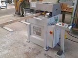 an image of a machine that is cutting wood
