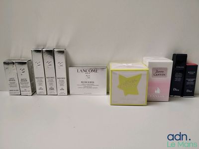 many different types of perfumes on the table