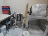 an image of a room with a lot of stuff on the floor