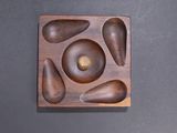 a wooden object that is sitting on a table