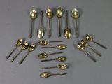 a lot of spoons and spoon spoons on the table