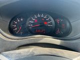 a close up of a car dashboard with a speedometer