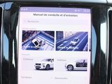 a car dashboard with a cell phone in it