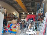 a picture of a warehouse filled with lots of assorted items