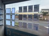a large window that has a lot of pictures on it
